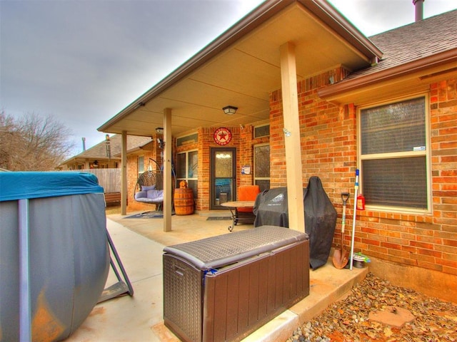 view of patio / terrace with fence