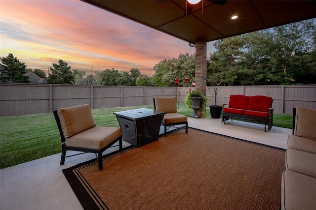 view of patio featuring an outdoor living space and a fenced backyard