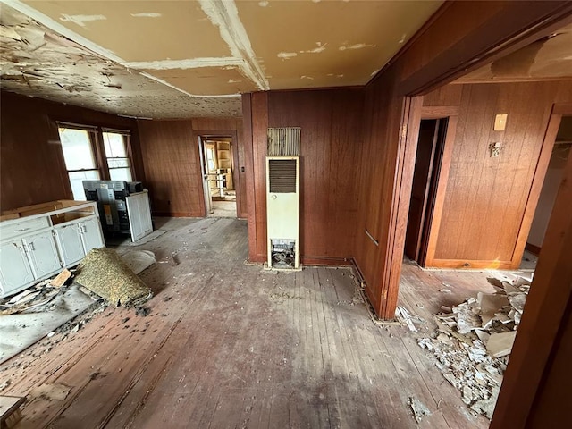 interior space featuring wood walls