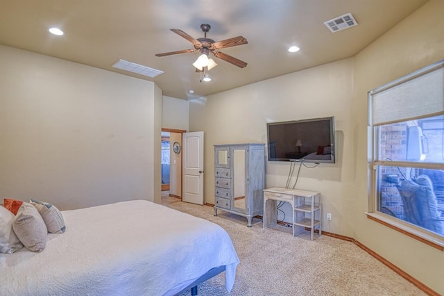 carpeted bedroom featuring recessed lighting, visible vents, baseboards, and a ceiling fan