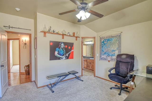 interior space with baseboards, carpet, and ceiling fan