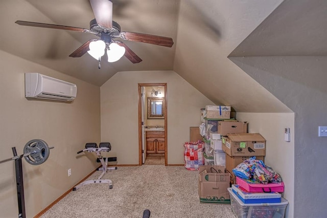 rec room with baseboards, lofted ceiling, a wall unit AC, carpet flooring, and a ceiling fan