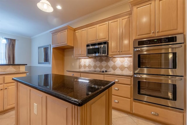 kitchen with light tile patterned floors, stainless steel appliances, crown molding, and light brown cabinets