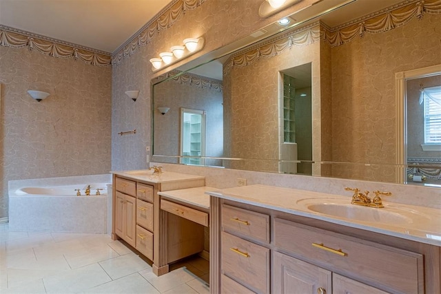 bathroom featuring tile patterned floors, a garden tub, vanity, and wallpapered walls