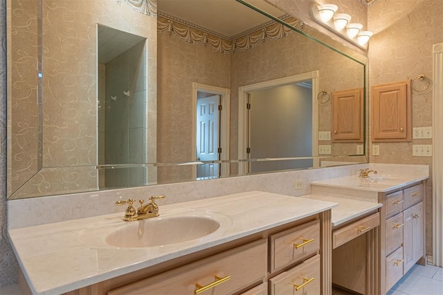 full bathroom featuring wallpapered walls, vanity, and tile patterned flooring