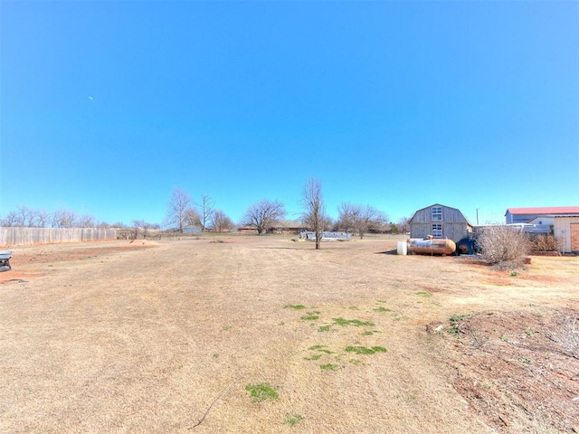 view of yard with a barn and an outdoor structure