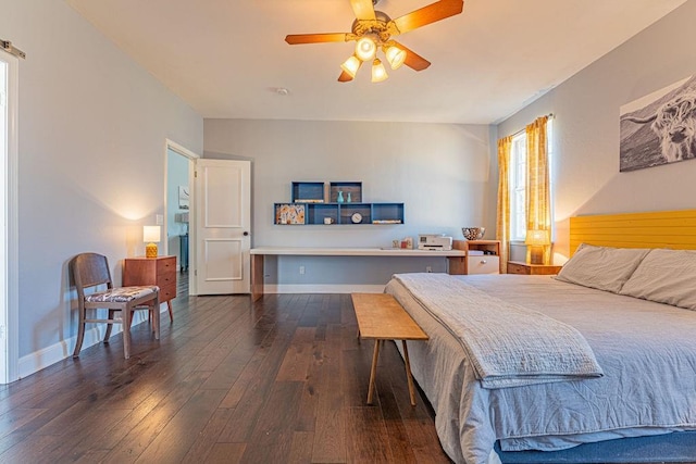 bedroom with ceiling fan, baseboards, and dark wood-style floors