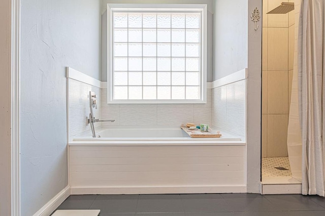 full bath with a shower stall, a garden tub, and tile patterned floors