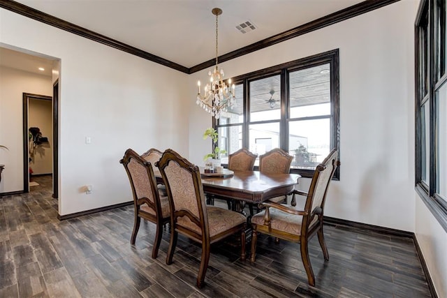 dining space with baseboards, a chandelier, ornamental molding, and dark wood finished floors