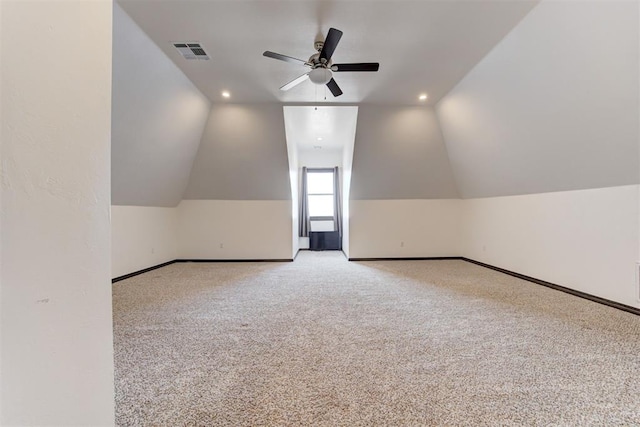 bonus room with a ceiling fan, carpet flooring, lofted ceiling, baseboards, and recessed lighting