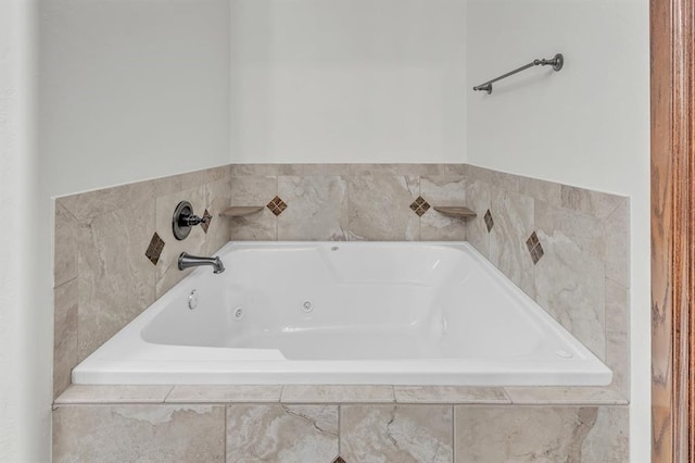 full bath featuring a tub with jets
