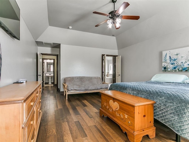 bedroom with visible vents, lofted ceiling, dark wood finished floors, and a ceiling fan