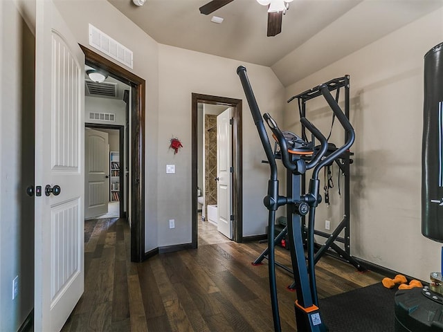 workout room featuring dark wood-style floors, visible vents, baseboards, and ceiling fan