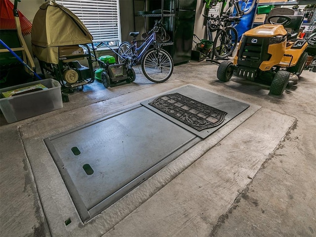 entry to storm shelter featuring a garage