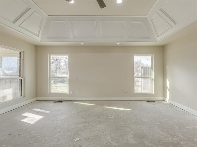 unfurnished room with baseboards