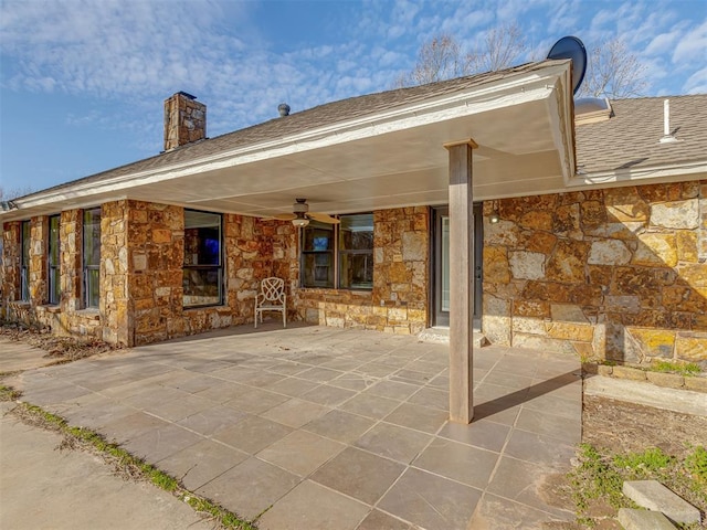 view of patio featuring a ceiling fan