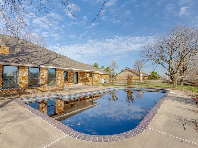 view of pool featuring a fenced in pool, a patio, and fence