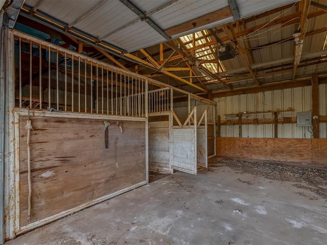 view of horse barn with electric panel