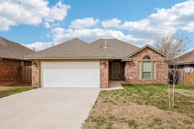 single story home featuring fence, a shingled roof, concrete driveway, a garage, and brick siding