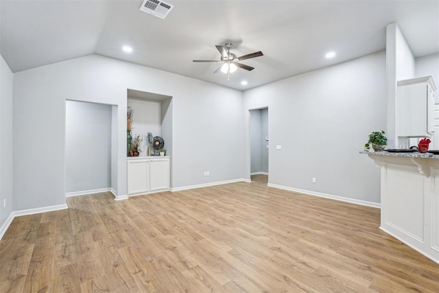 unfurnished living room featuring visible vents, lofted ceiling, recessed lighting, ceiling fan, and light wood-style floors