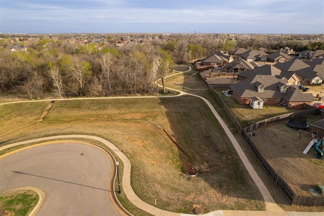 birds eye view of property with a residential view