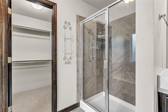 full bathroom with a stall shower