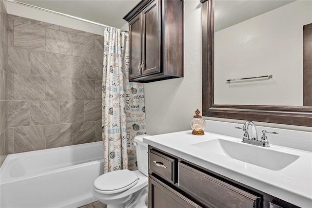 bathroom with vanity, shower / bath combination with curtain, and toilet