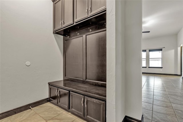 mudroom featuring baseboards