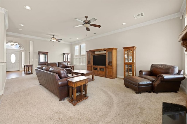 living room with visible vents, crown molding, ceiling fan, light colored carpet, and recessed lighting