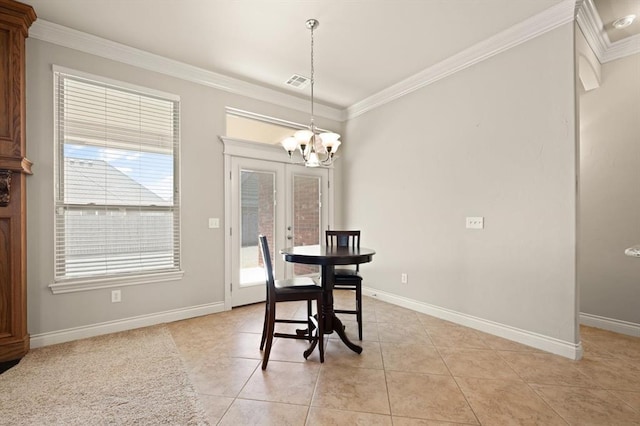 dining area featuring light tile patterned floors, visible vents, an inviting chandelier, and crown molding