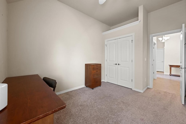 office space featuring baseboards, carpet floors, and a chandelier