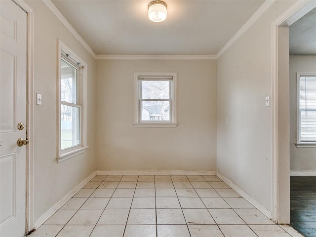 unfurnished room featuring light tile patterned floors, baseboards, and ornamental molding