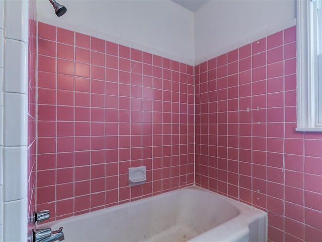 full bath featuring shower / bathtub combination