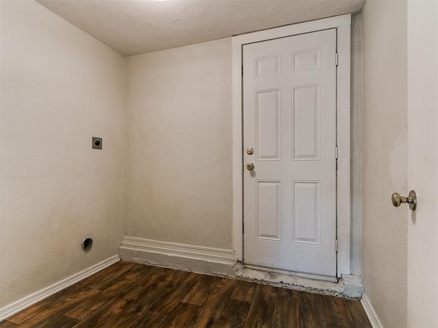 laundry room with baseboards, hookup for an electric dryer, dark wood-style flooring, and laundry area