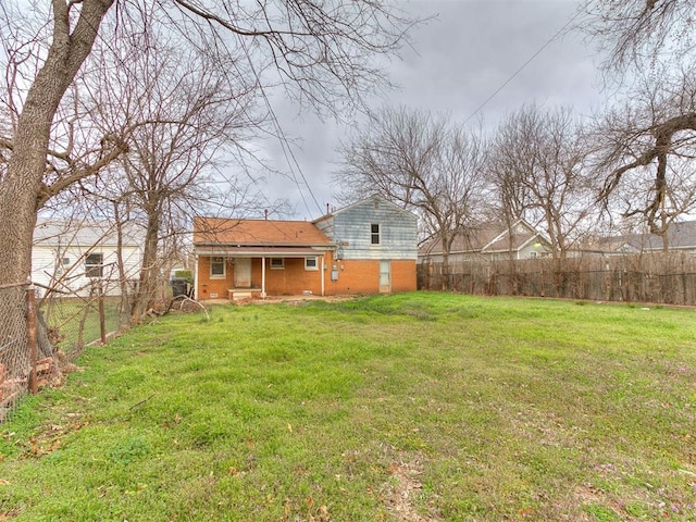 view of yard featuring a fenced backyard