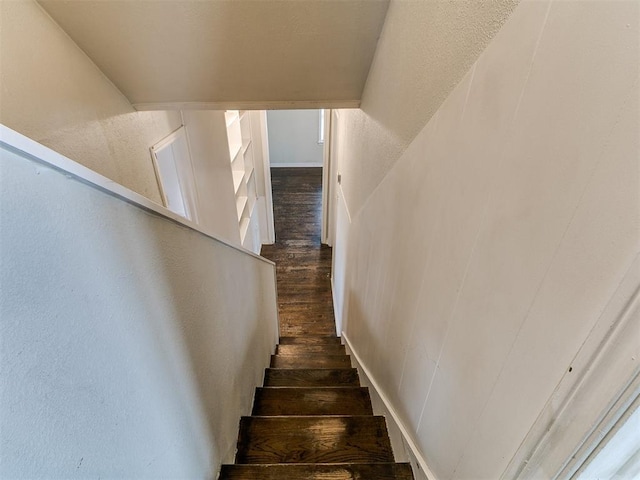 3216 NW 30th St, Oklahoma City, OK 73112 - stairs featuring wood finished floors and a textured wall