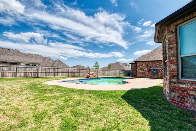 view of pool with a patio, a fenced in pool, a fenced backyard, and a lawn