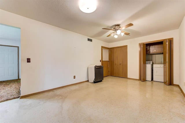 4801 Del Crest Dr, Del City, OK 73115 - unfurnished bedroom with independent washer and dryer, two closets, and a ceiling fan