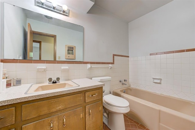 4801 Del Crest Dr, Del City, OK 73115 - bathroom featuring a garden tub, vanity, tile patterned floors, and tile walls