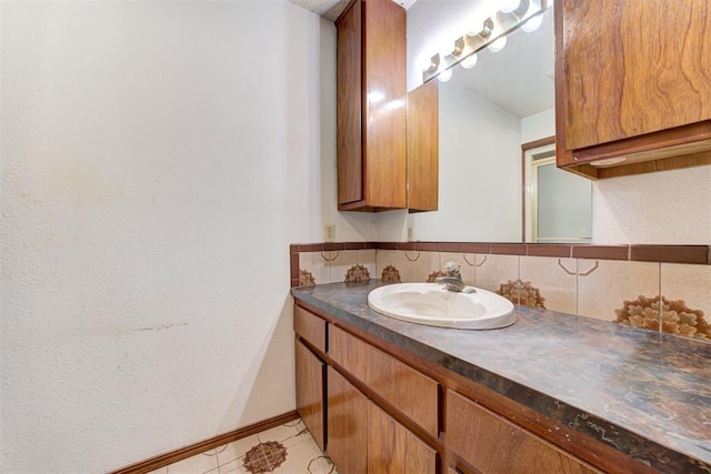 4801 Del Crest Dr, Del City, OK 73115 - bathroom with vanity and backsplash