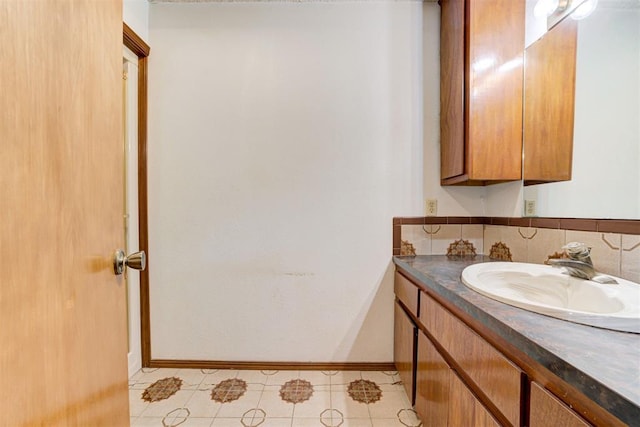 4801 Del Crest Dr, Del City, OK 73115 - bathroom featuring vanity, tile patterned flooring, and tasteful backsplash