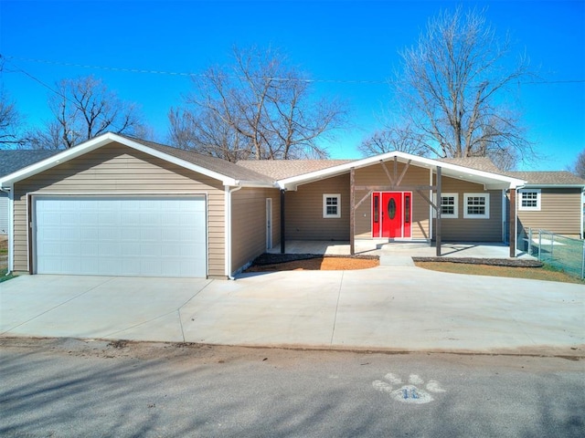 view of front facade with driveway and a garage