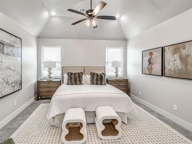 bedroom with multiple windows, baseboards, and vaulted ceiling