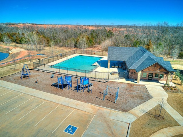 view of pool featuring a fenced in pool and fence