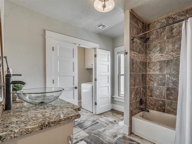 full bath featuring vanity, baseboards, visible vents, and shower / tub combo with curtain