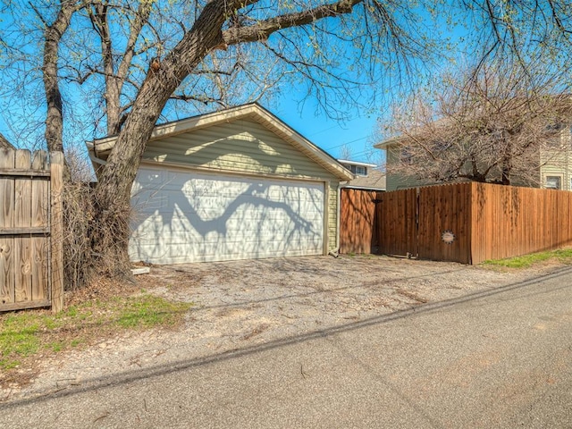 detached garage with fence