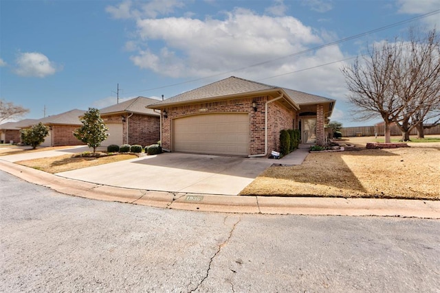 view of front facade with fence, driveway, a shingled roof, a garage, and brick siding