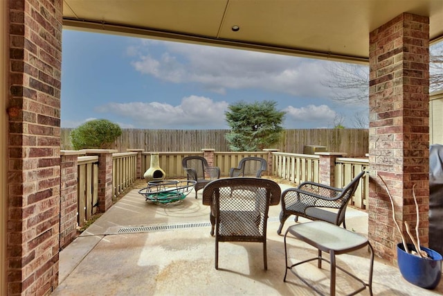 view of patio / terrace with fence