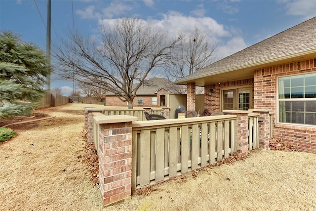 view of patio with fence