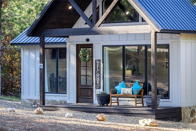 doorway to property with board and batten siding